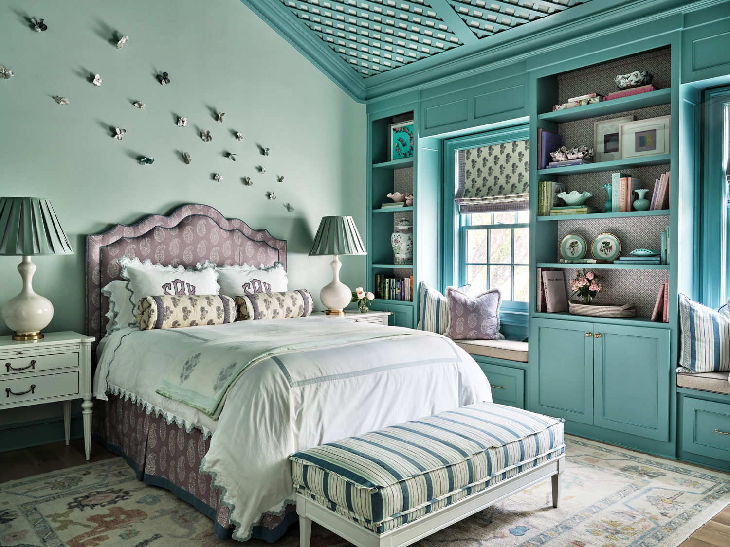 Tori Rubinson Interiors teal bed room with lavender headboard