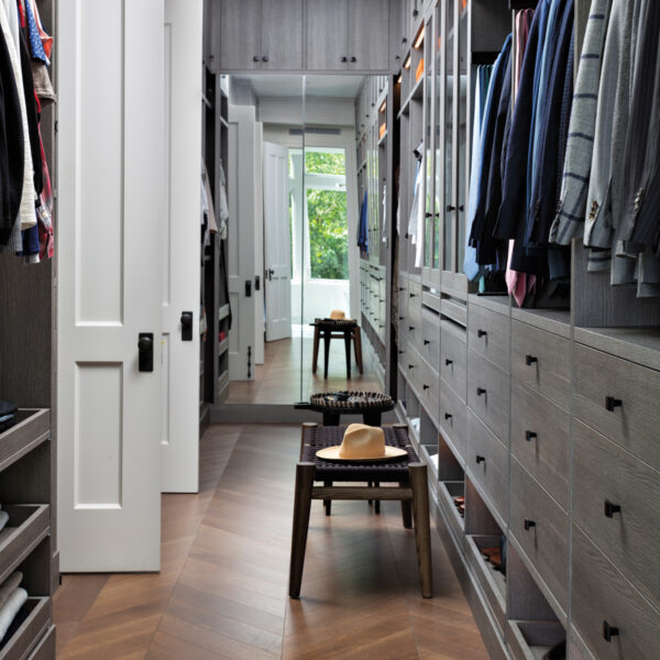 A long narrow ash-colored closet with built-ins. RED Winner.
