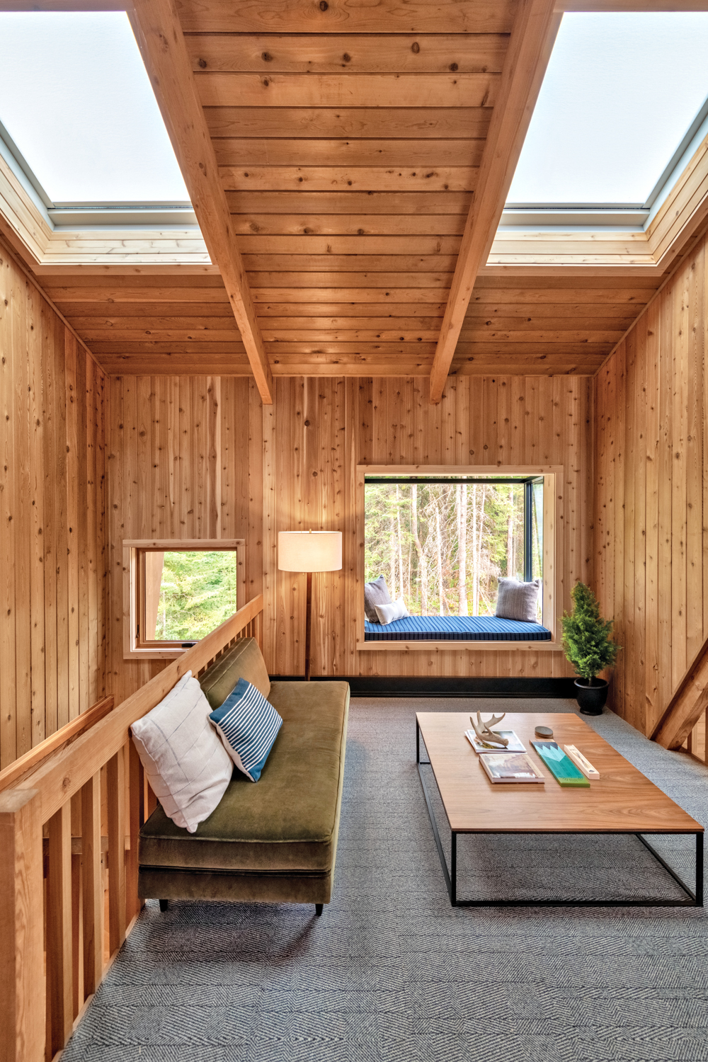 A completely wooden room with a pixture-box window seat. RED Winner.