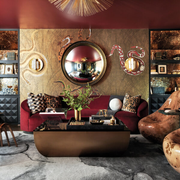 Red and gold speakeasy-inspired lounge area. RED Winner.