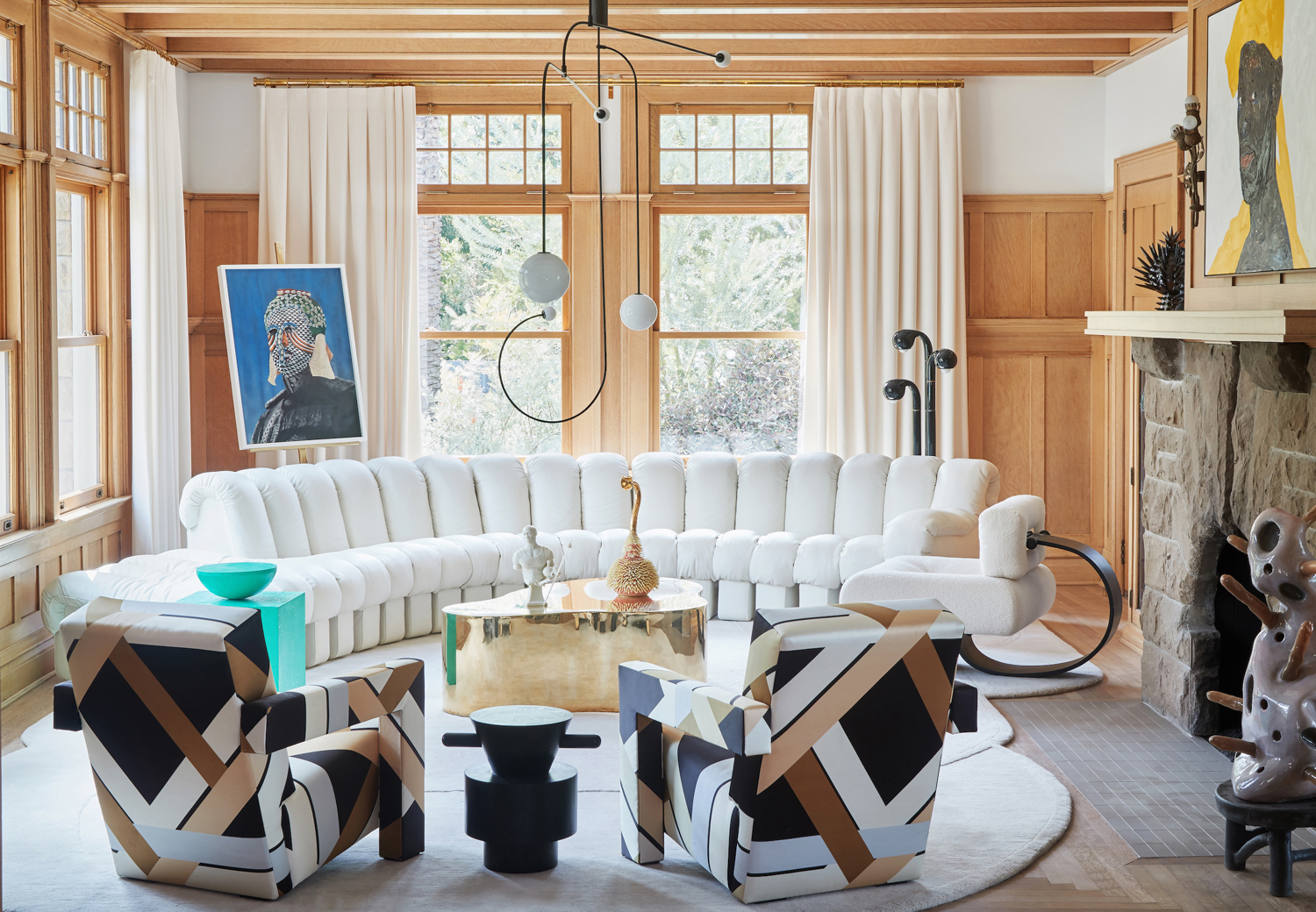Ghislaine Vinas modern living room with white sectional red winner